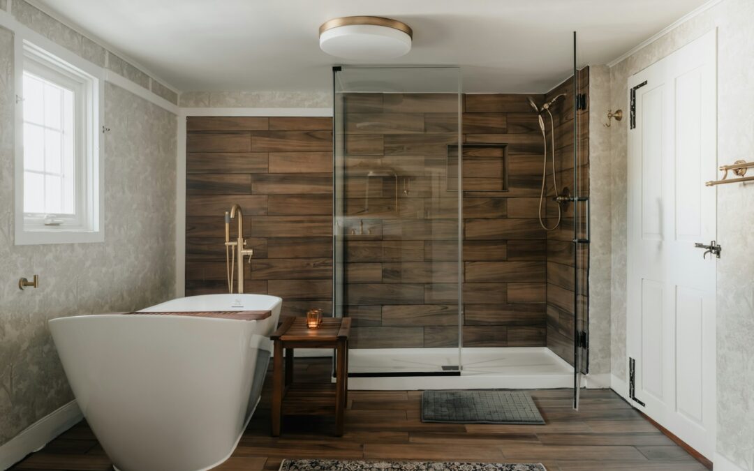 A bathroom with a bathtub and a shower